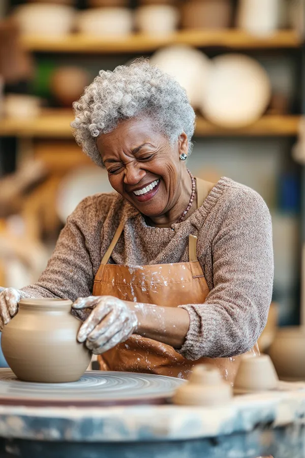Peripheral-Neuropathy-Treatment An older woman happily working on a ceramic bowl. Get treatment for Peripheral Neuropathy from ProCare Wellness Institute in Savannah.