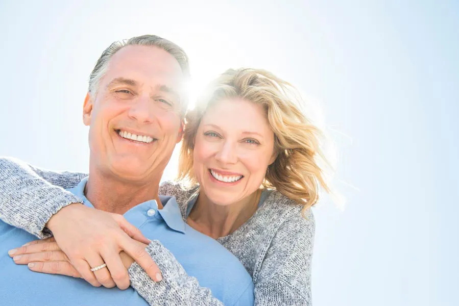 Radiofrequency-Microneedling-for-Age-Spots-Sun-Damage-Specialist A couple with clear radiant skin. Get Radiofrequency Microneedling for Age Spots from ProCare Wellness Institute in Savannah.
