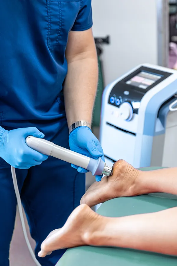 Shockwave-Therapy-for-Orthopedics A clinician performs a shockwave procedure on a patient's foot. Get Shockwave Therapy for Orthopedics from ProCare Wellness Institute in Savannah.