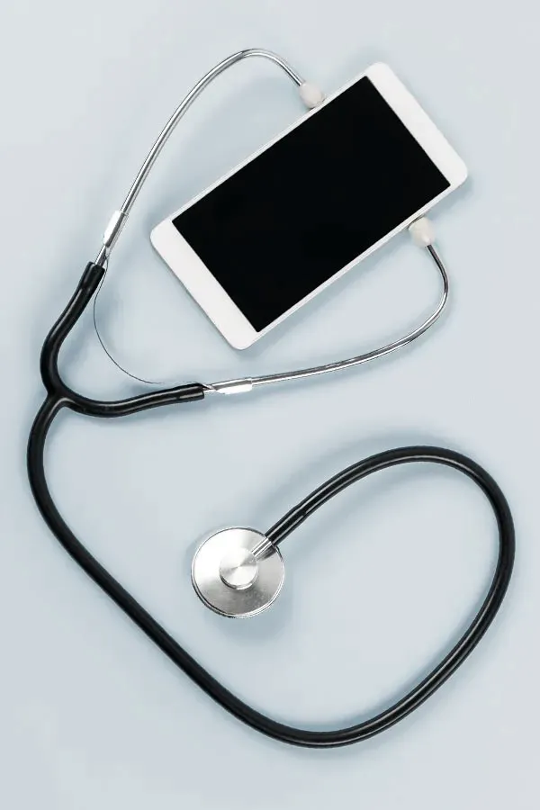 Telemedicine-Treatment A smartphone with a stethoscope attached to it, symbolizing Telemedicine treatment from ProCare Wellness Institute in Savannah.